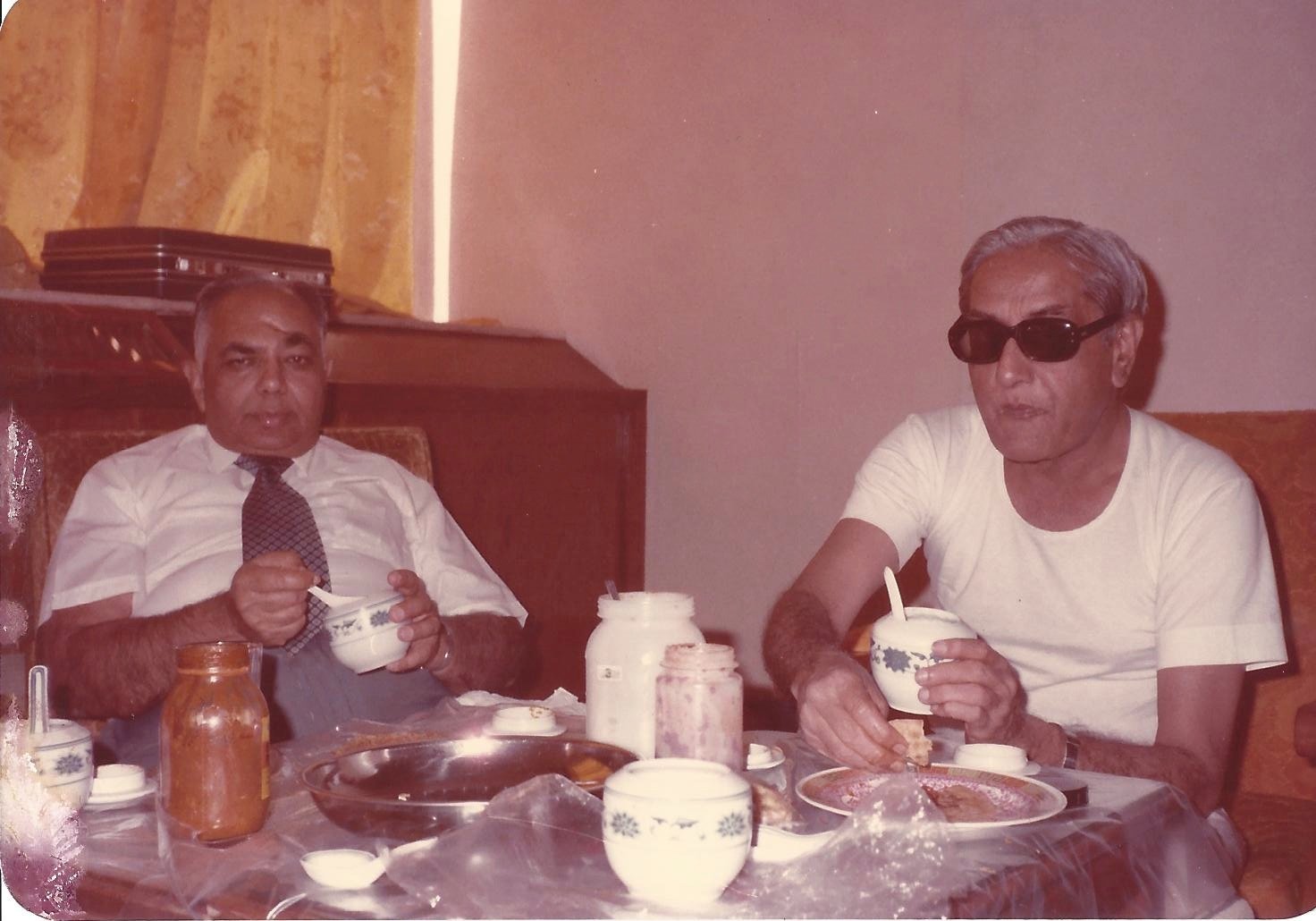 Mr. Patak and Gopaldas Dattani at dinner, Dong Fang Hotel
